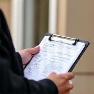 Image representing property inspections with clipboard and property